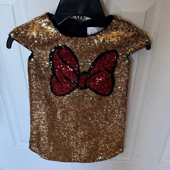 Disney Other - Disney Sparkling Gold Dress with Red Sequin Bow